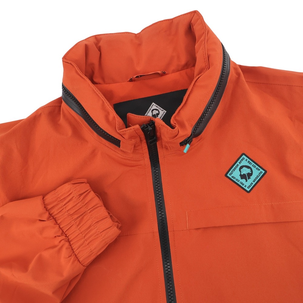 Outdoor Afro x REI Co-op Stowable Hood Jacket Orange Long Sleeve Mens Medium